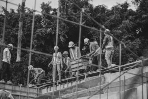 Group of Construction Workers on the job. Construction Metrics